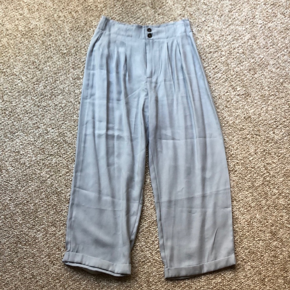 Gray frayed trousers
